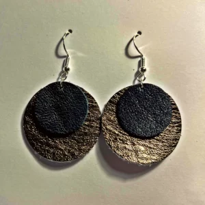 Boucles d'oreilles ronde en cuir bleu et bronze avec une monture en argent 925/1000